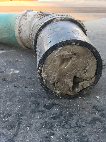 Removal of a Section of Clogged Pipe at Manufacturing Facility